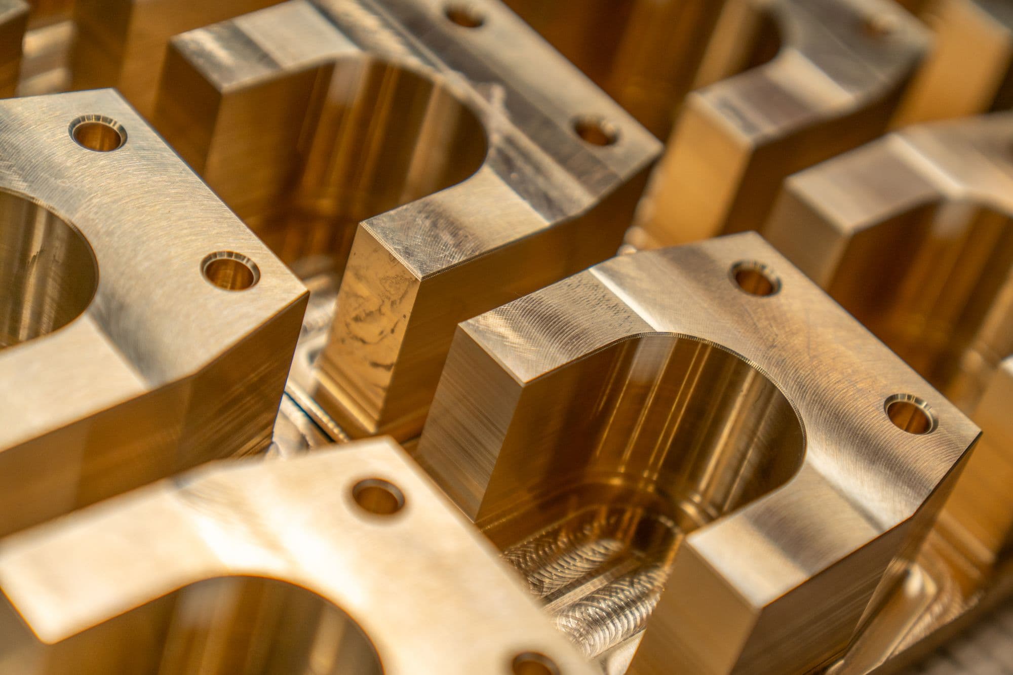 Close-up of precision-machined metal components, representative of defence-grade engineering and manufacturing